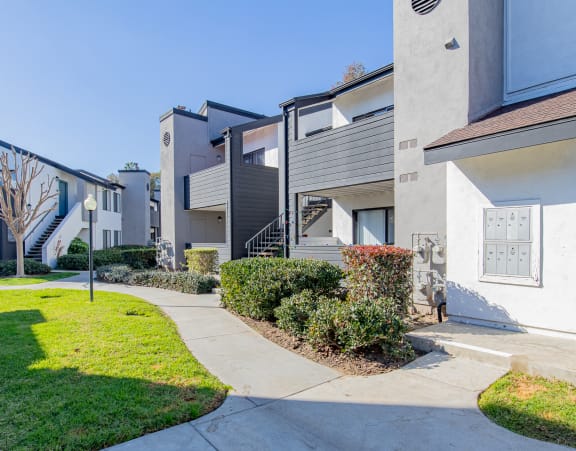 the preserve at ballantyne commons apartments exterior with sidewalk and grass