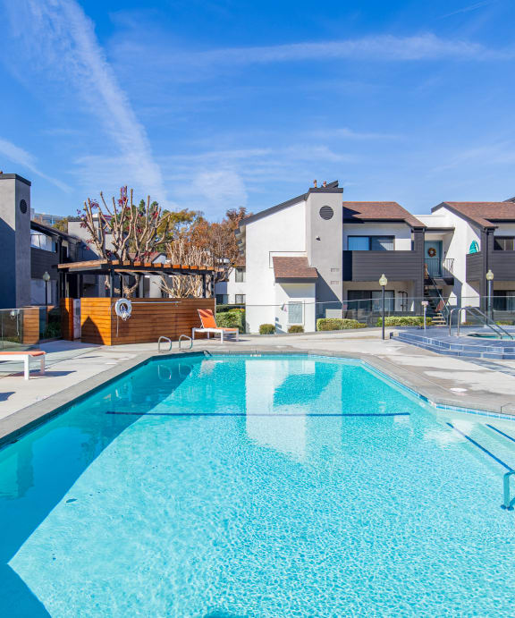 our apartments have a large swimming pool with apartments in the background