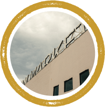 A building with the word "Maxon" written on its side.