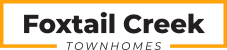 the logo town homes with the words football on