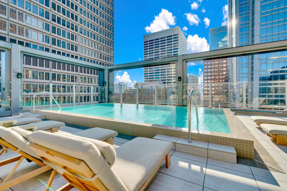 A sunny day at the rooftop pool with loungers. at 17 Market West, Philadelphia, PA 19103