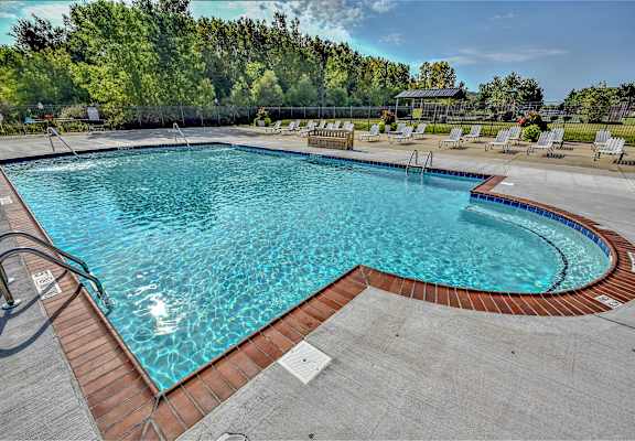 A large outdoor swimming pool at Evergreen Luxury Apartments, Merrillville, Indiana