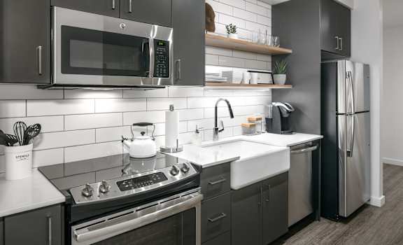 Apartments for Rent in Portland, OR - Couch9 Kitchen With Stainless Steel Appliances and Modern Wood Cabinets