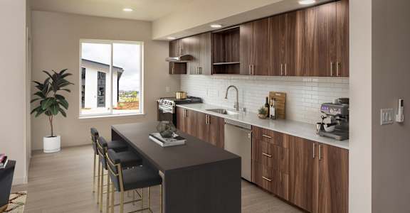 A kitchen with a black island and wooden cabinets.