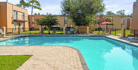 the gym at the enclave at woodbridge apartments in sugar land, tx