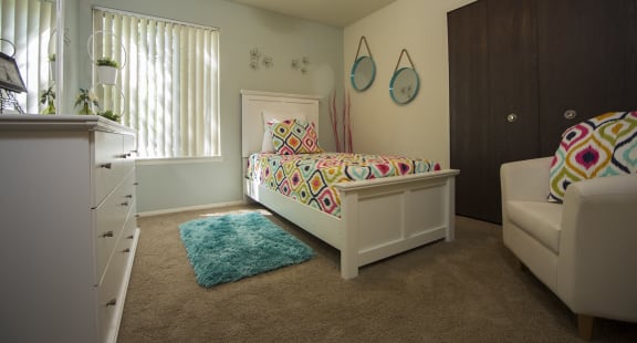 Bedrooms with large closets at Westwood Village Apartments in Westland, MI, 48185