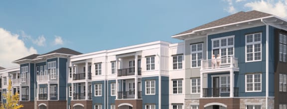a rendering of an apartment building with cars parked in front of it at The Bella at Westchester, Midlothian