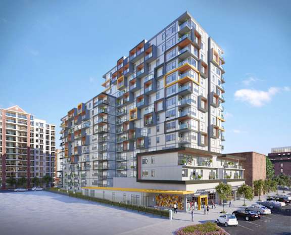 a rendering of an apartment building on a city street