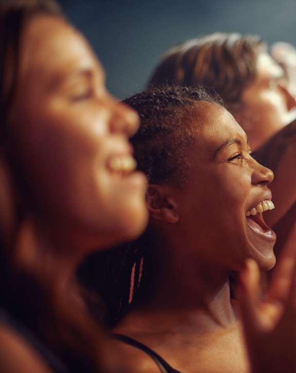 A group of people are enjoying a concert.