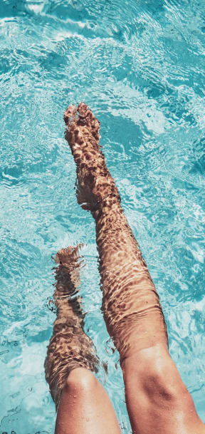 Dipping Toes in Swimming Pool at Oak Pointe Apartments in Fremont, CA 94538