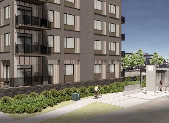 a rendering of an apartment building on a street corner with a sidewalk