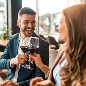couple drinking wine in a restaurant