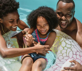 Family in pool at The Fountains of Fair Oaks in Fair Oaks, CA 95628