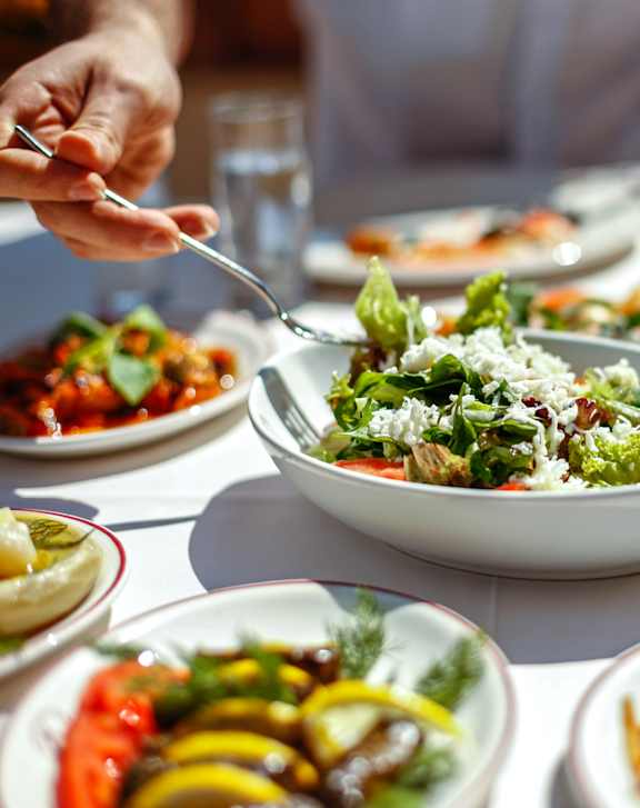 a table full of plates of food