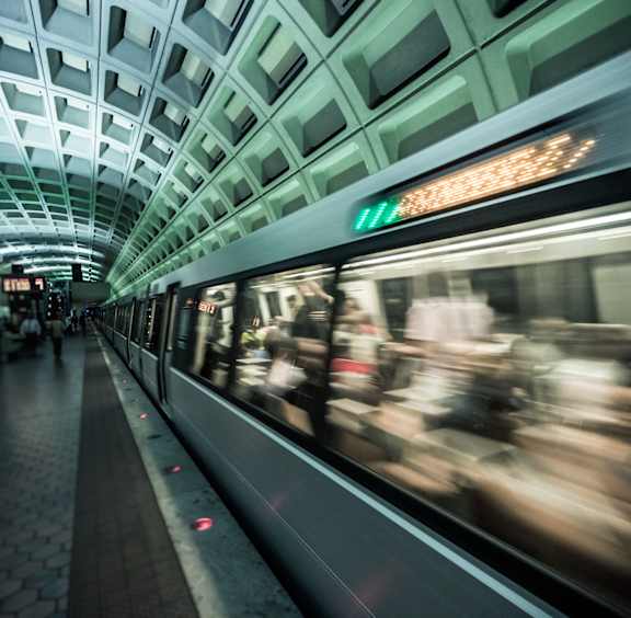 A subway train is coming into the station.