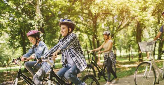 a group of kids riding bikes in a park at Union at Tryon in NC 28262