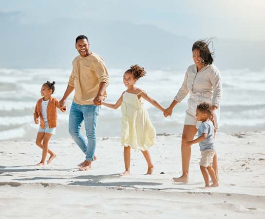 a family walking on the beach at Wharf 7 Apartments, South Carolina, 29492
