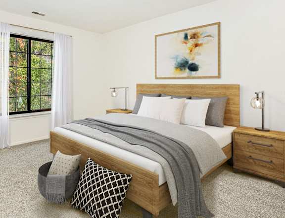 A bedroom with a large bed, a nightstand, and a window with curtains at Tanglewood Apartments, Oak Creek