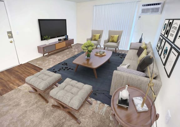 a living room with a couch and a television