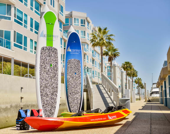 a row of surfboards standing in front of a building at Esprit Apartments, Marina del Rey, 90292