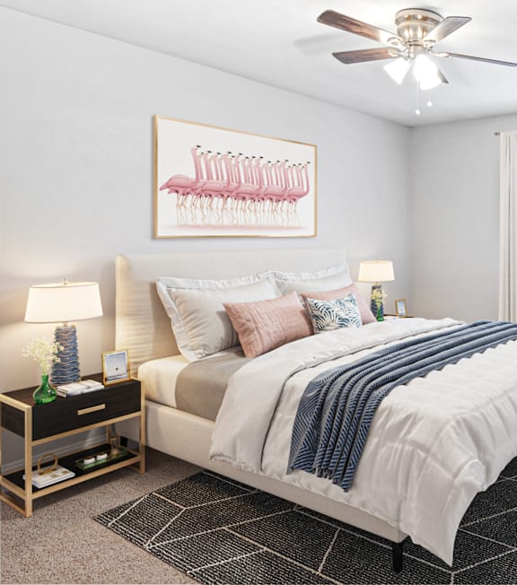 a bedroom with a large bed and a ceiling fan at Balfour East Lake in Atlanta, GA