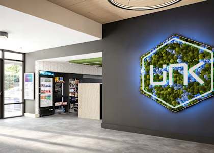 a sign on a wall in the lobby of a store at Link Apartments® CYKEL Apartments, Charlotte , NC
