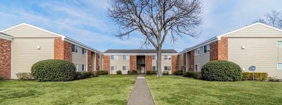 our apartments are located in a quiet neighborhood with a sidewalk