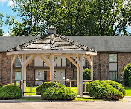 a gazebo in front of a building