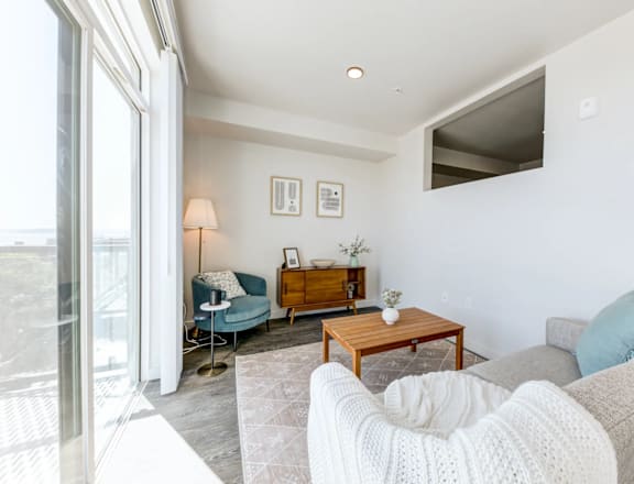a living room with a couch and a table