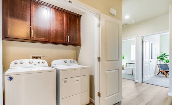 A laundry room with a washer and dryer.
