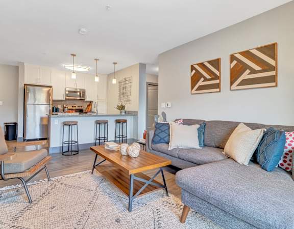 Living room with tons of natural light at Latitude at South Portland Apartment, Maine, 04106