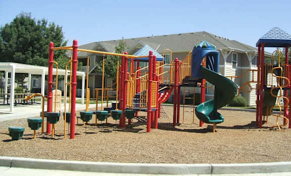 An image of the properties playground with tables in the background