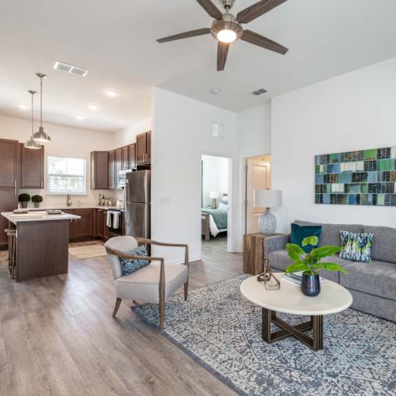 Large living room attached to a kitchen at Estia at Lakewood Ranch, Bradenton, Florida