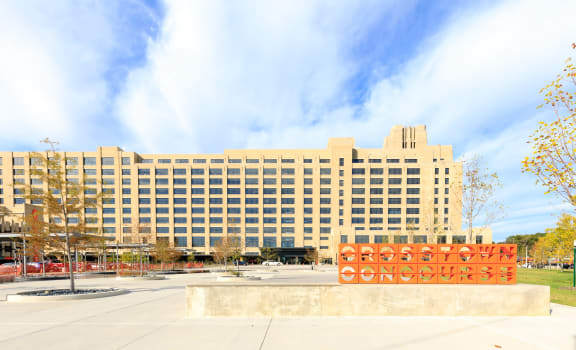 a rendering of a neighborhood with houses and people on a sidewalk at Parcels at Concourse, Memphis, TN