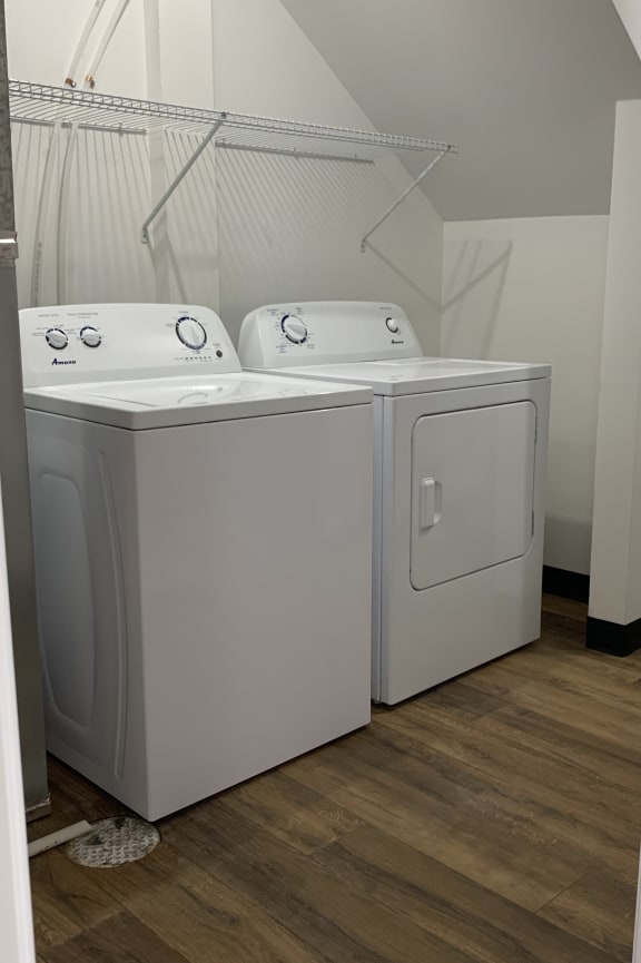 a bathroom with a toilet and a sink and a bath tub