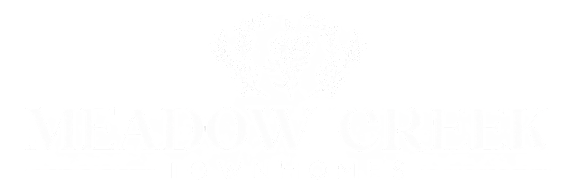 A graphic of a magnolia flower is superimposed over the text "The MAGNOLIA".