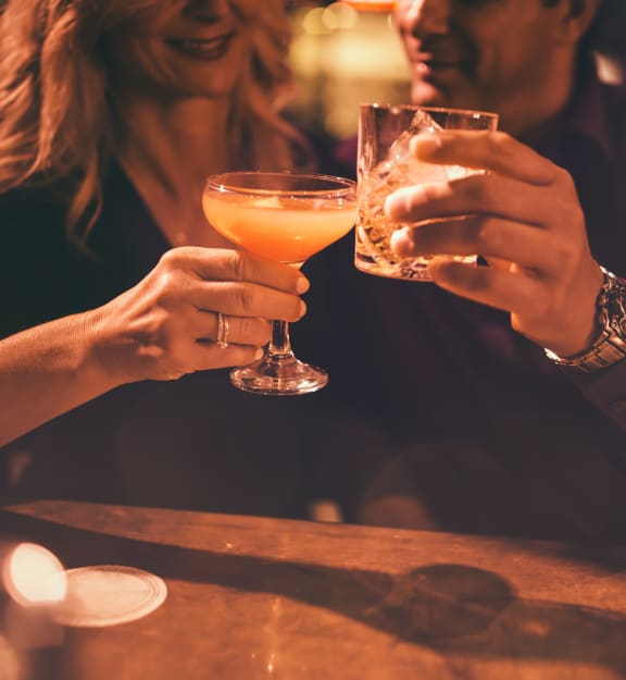 people sitting at a bar with drinks in their hands at Preston Centre, Columbus, OH, 43215