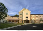 Thumbnail 2 of 5 - a rendering of the exterior of a building with a sidewalk