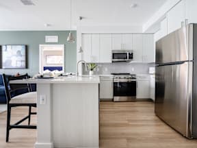 Modern Kitchens with Stainless Steel Appliances at Marquee Square Apartments in Seminole Heights Tampa FL
