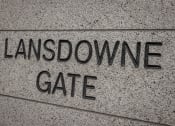 Thumbnail 1 of 6 - a sign on the side of a building that reads lansdowne gate