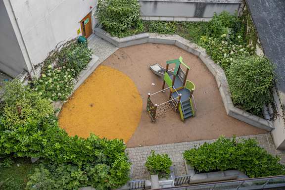 an overhead view of a yard with chairs and a table