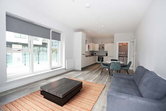 a living room with a couch and a coffee table