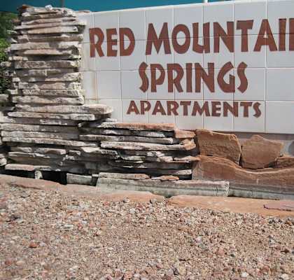 a sign for red mountain springs apartments