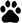 a dark room with black furniture and a black background