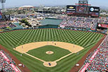 A baseball stadium is packed with fans.