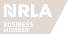 A business member sign on a wall.