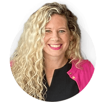 A woman with blonde curly hair and a black top.