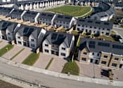 Thumbnail 3 of 4 - an aerial view of houses in a suburb