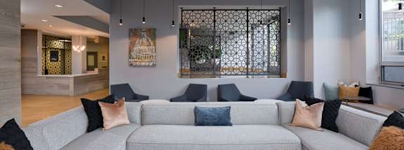 a living room filled with furniture and a large window at 3333 Wisconsin, Washington, Washington