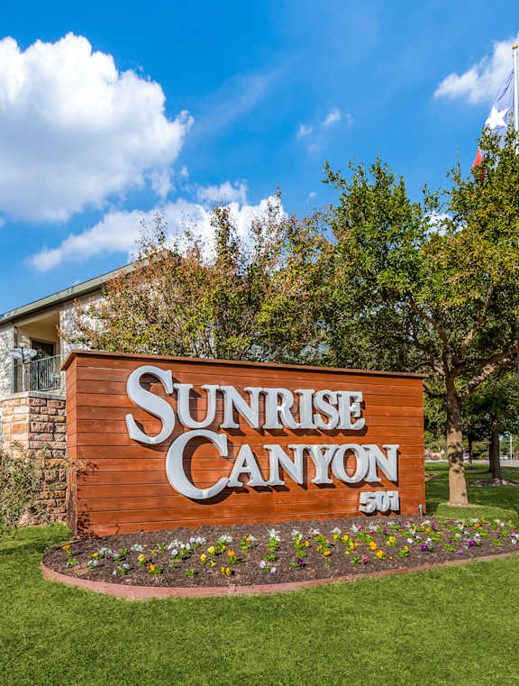 the sign for sunrise canyon in front of the sunrise canyon office building at Sunrise Canyon, Universal City, TX, 78148